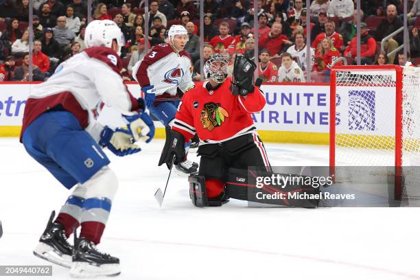 Zach Parise of the Colorado Avalanche scores a goal past Petr Mrazek of the Chicago Blackhawks during the first period at the United Center on...