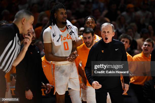 Head coach Rick Barnes and the Tennessee Volunteers bench react to a call against the Auburn Tigers in the second half at Thompson-Boling Arena on...