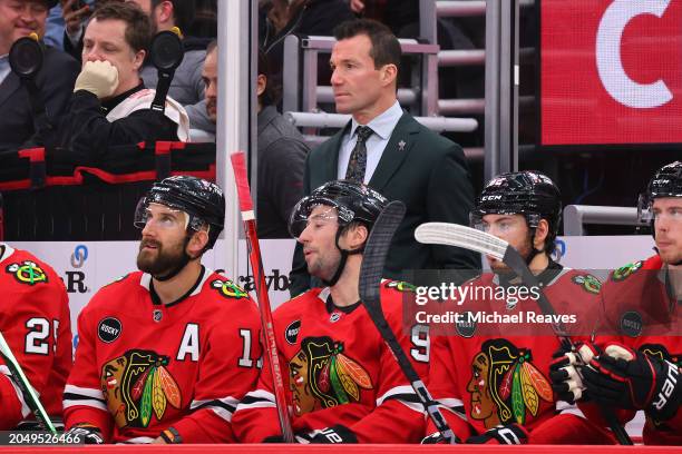 Head coach Luke Richardson of the Chicago Blackhawks looks on against the Colorado Avalanche during the second period at the United Center on...