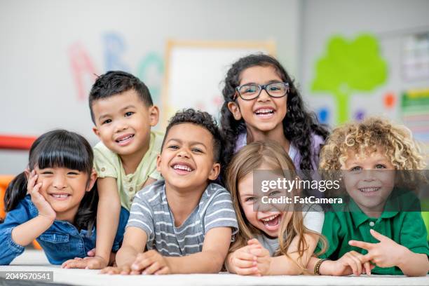 kindergarten portraits - diverse elementary school kids stock pictures, royalty-free photos & images