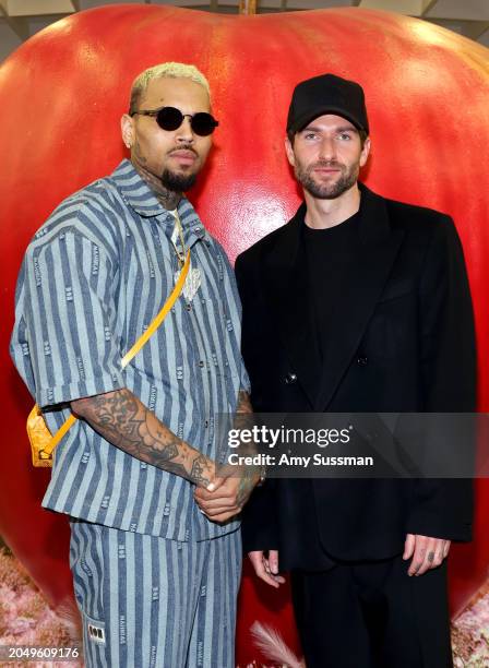 Chris Brown and Doni Nahmias attend the Maxfield LA Nahmias X Reisinger Takeover Event at Maxfield on February 29, 2024 in Los Angeles, California.