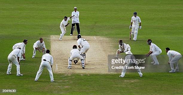Saqlian Mushtaq of Surrey sends down a delivery on the fourth day of the Frizzell County Championship, Division One match between Surrey and Sussex...