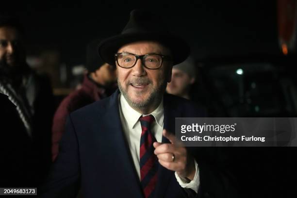 Workers Party of Britain candidate George Galloway celebrates with supporters at his campaign headquarters after being declared the winner in the...