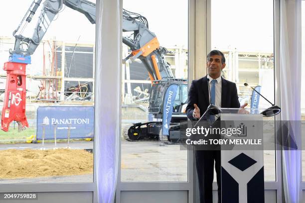 Britain's Prime Minister Rishi Sunak delivers a speech to business and construction representatives during a visit to Panattoni Park, an industrial...