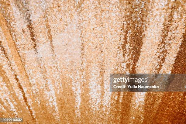 background with gold sequins. full frame, defocus. - gold sequin dress stock pictures, royalty-free photos & images