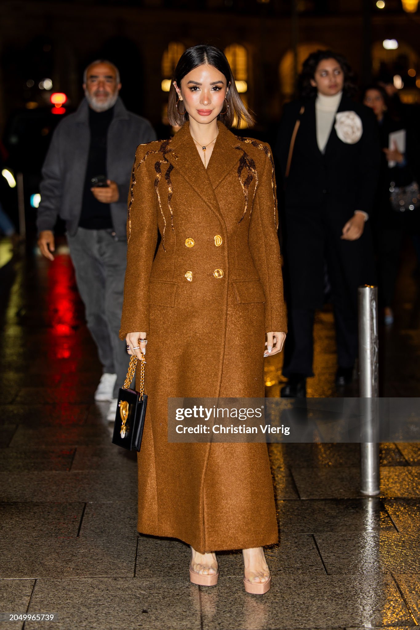 paris-france-heart-evangelista-wears-brown-coat-outside-schiaparelli-during-the-womenswear.jpg