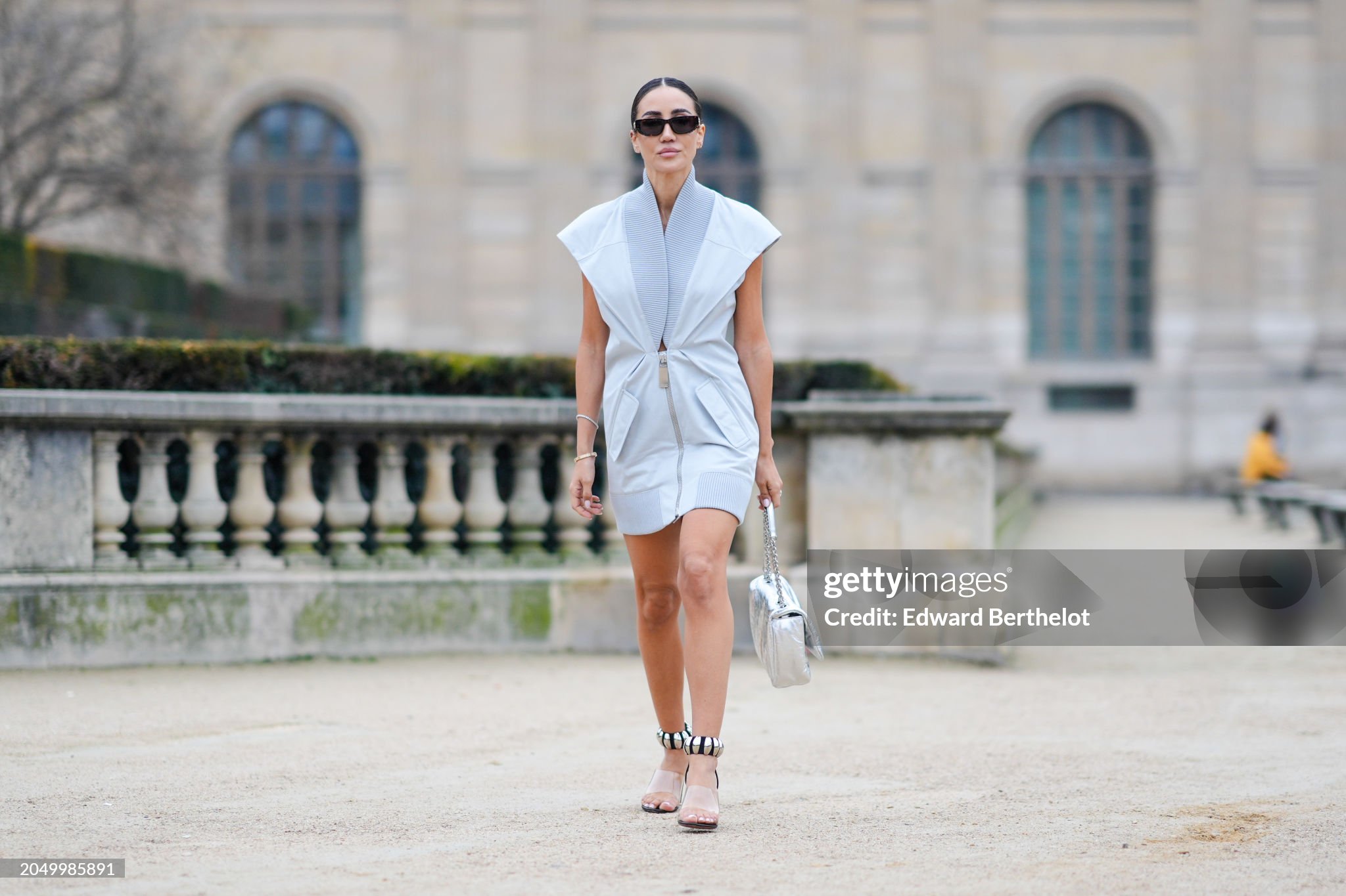 paris-france-tamara-kalinic-wears-sunglasses-a-pastel-pale-blue-mini-gathered-dress-with.jpg