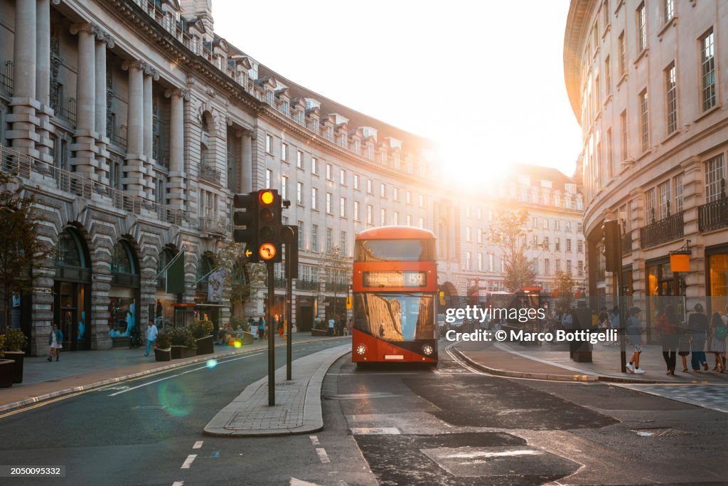 Red double-decker buse on Regent Street, London, UK