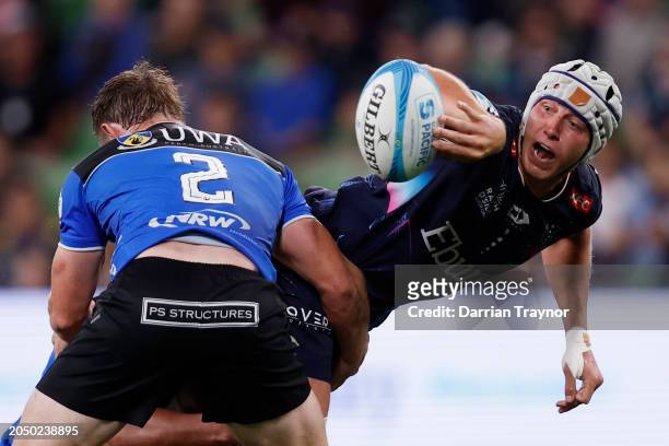 Josh Canham of the Rebels passes the ball during the round two Super Rugby Pacific match between Melbourne Rebels and Western Force at AAMI Park, on...