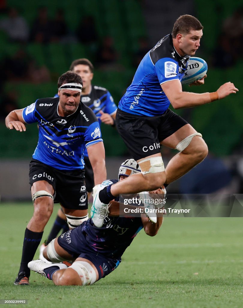 Rebels Rugby Josh Canham of the Rebels tackles Will Harris of the Western Force ...
