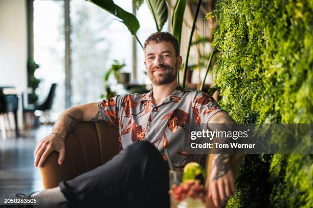 relaxed man in urban jungle - man introducing himself stock pictures, royalty-free photos & images