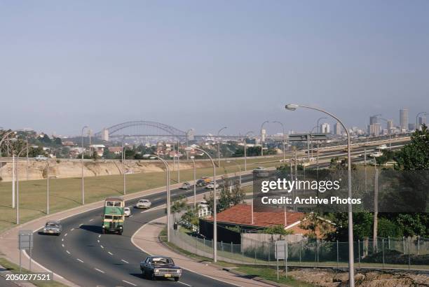 High-angle view of traffic on the highway with Gladesville Bridge in the background, as seen from the Gladesville suburb of Sydney, New South Wales,...