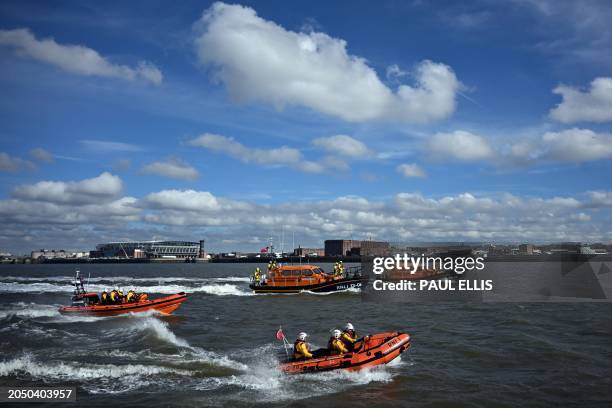 With the Liverpool skyline in the background, Royal National Lifeboat Institution lifeboats from Lytham St Annes, Hoylake, New Brighton and West...