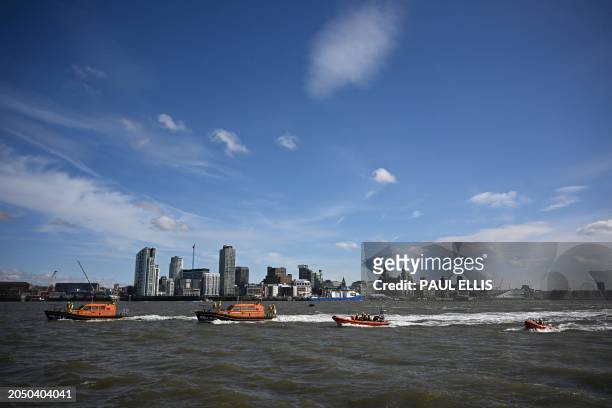 With the Liverpool skyline in the background, Royal National Lifeboat Institution lifeboats from Lytham St Annes, Hoylake, New Brighton and West...