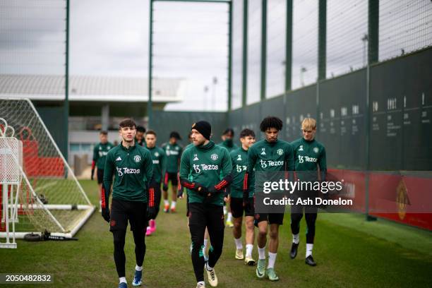 Charlie McNeill, Christian Eriksen, Ethan Williams of Manchester United in action during a first team training session at Carrington Training Ground...