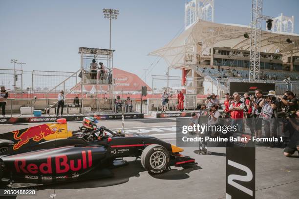 Race winner Arvid Lindblad of Great Britain and PREMA Racing climbs out of his car in parc ferme during the Round 1 Sakhir Sprint race of the Formula...