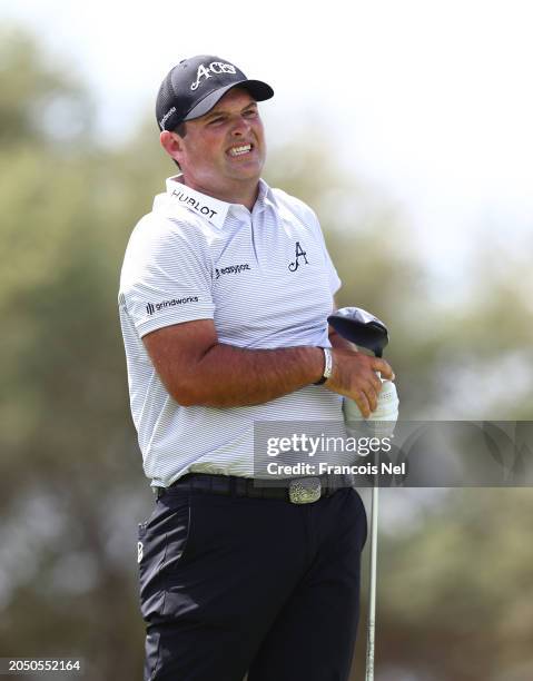 Patrick Reed of 4Aces reacts after hitting his tee shot on the 9th hole during day one of the LIV Golf Invitational - Jeddah at Royal Greens Golf &...