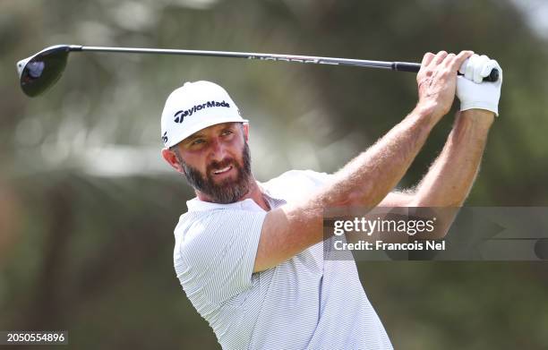 Dustin Johnson of 4Aces plays a tee shot on the 9th hole during day one of the LIV Golf Invitational - Jeddah at Royal Greens Golf & Country Club on...