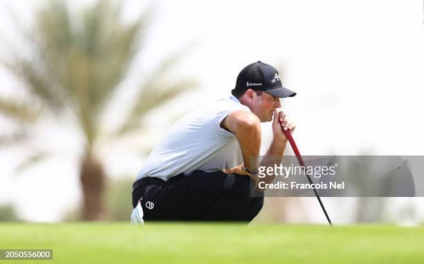 Patrick Reed of 4Aces lines up a putt during day one of the LIV Golf Invitational - Jeddah at Royal Greens Golf & Country Club on March 01, 2024 in...