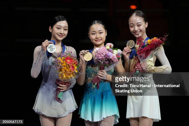 Silver medalist Jia Shin of South Korea, gold medalist Mao Shimada of Japan and bronze medalist Rena Uezono of Japan pose at the medal ceremony after...