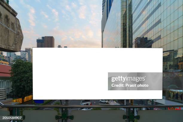 urban canvas billboard skyline at dusk - billboard mockup stock pictures, royalty-free photos & images