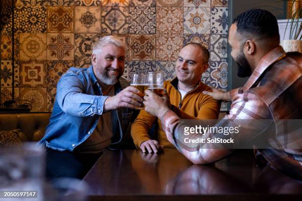 cheers to friendship - togetherness symbol stock pictures, royalty-free photos & images