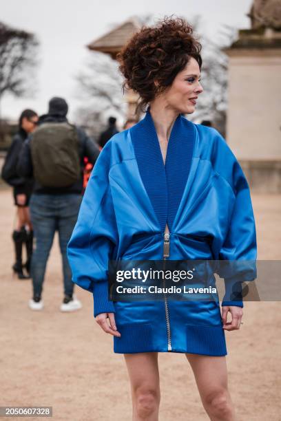 Coco Rocha wears blue Off-White jacket dress, outside Off-White, during the Womenswear Fall/Winter 2024/2025 as part of Paris Fashion Week on...