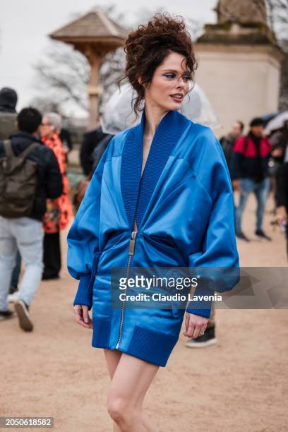 Coco Rocha wears blue Off-White jacket dress, outside Off-White, during the Womenswear Fall/Winter 2024/2025 as part of Paris Fashion Week on...