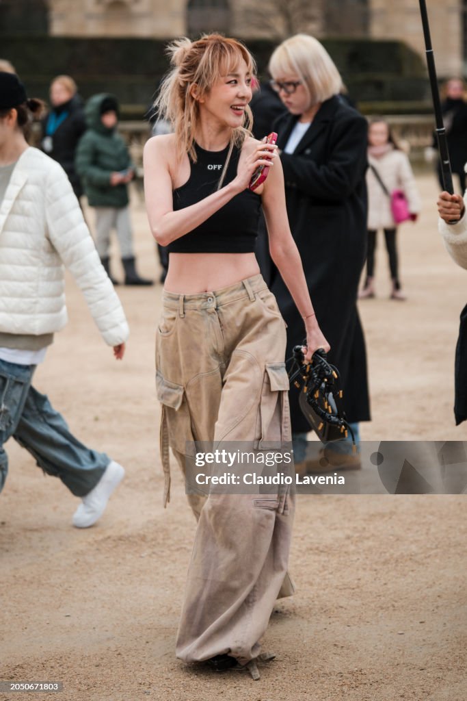 Street Style - Paris Fashion Week - Womenswear Fall/Winter 2024/2025 - Day Four