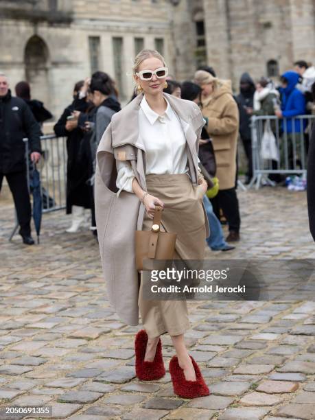 Leonie Hanne attends the Loewe Womenswear Fall/Winter 2024-2025 show as part of Paris Fashion Week on March 01, 2024 in Paris, France.