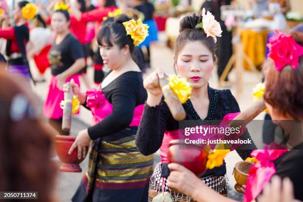 fun som tam thai dance in lampang - thai people stock pictures, royalty-free photos & images