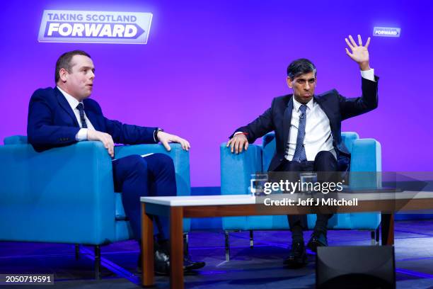 Scottish Conservative Party leader Douglas Ross with Britain's Prime Minister Rishi Sunak as he acknowledges applause following his keynote speech to...