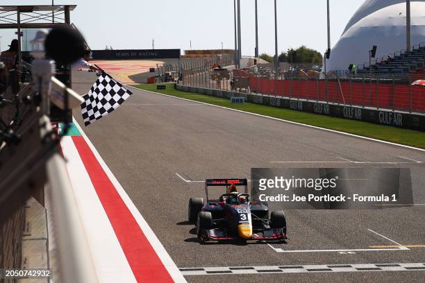 Race winner Arvid Lindblad of Great Britain and PREMA Racing takes the chequered flag during the Round 1 Sakhir Sprint race of the Formula 3...