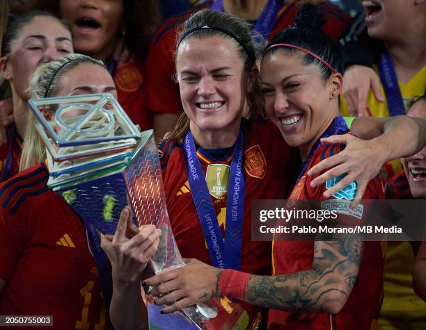 Irene Paredes and Jenni Hermoso of Spain holds the trophy after wining the UEFA Nations League Final Match between Spain and France at Estadio La...