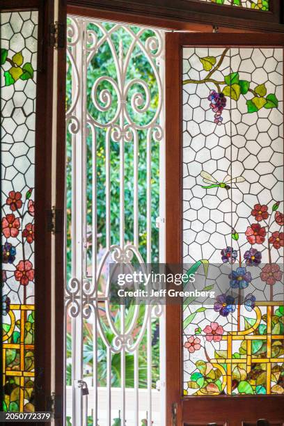 Merida, Mexico, Zona Paseo Montejo Centro, Quinta Montes Molina House Museum & Art Gallery, stained glass doors, ornamental wrought iron gate .