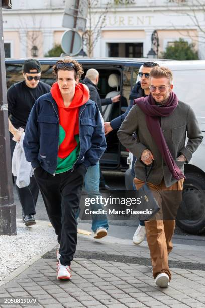 Brooklyn Beckham, Cruz Beckham, Harper Beckham and David Beckham are seen on March 01, 2024 in Paris, France.