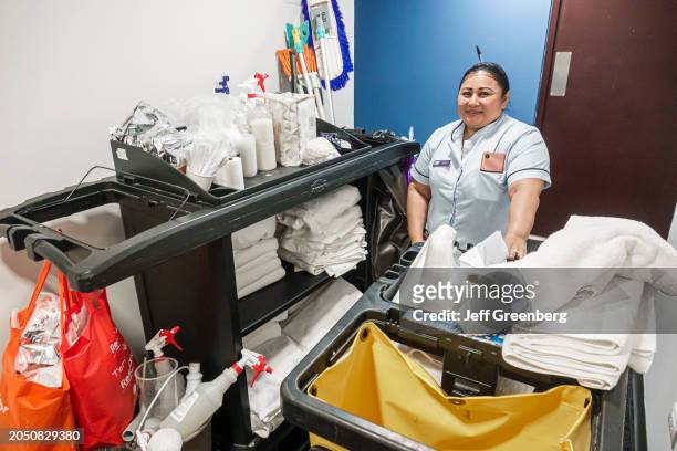 Merida, Mexico, Holiday Inn Express IGH, housekeeper housekeeping cleaning staff, cart clean towels.