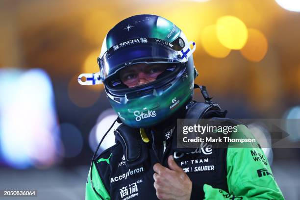 16th placed qualifier Valtteri Bottas of Finland and Stake F1 Team Kick Sauber walks in the Pitlane during qualifying ahead of the F1 Grand Prix of...