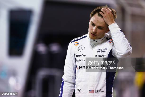 18th placed qualifier Logan Sargeant of United States and Williams walks in the Pitlane during qualifying ahead of the F1 Grand Prix of Bahrain at...