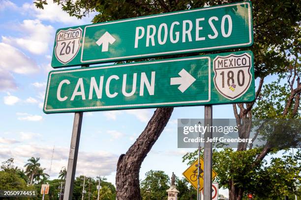 Merida, Mexico, Zona Paseo Montejo Centro, road signs directions to Progresso and Cancun.