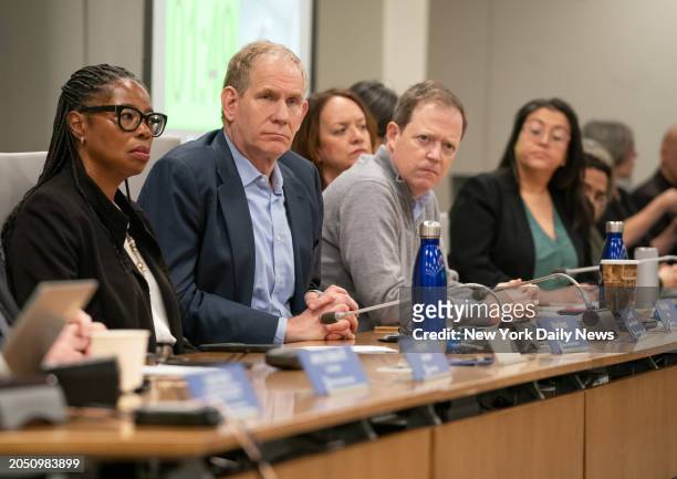 March 1: MTA Chair and CEO Janno Lieber, middle left, and Richard Davey, President, New York City Transit, middle right, listen to speakers during a...