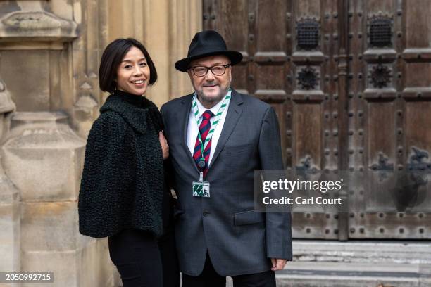 George Galloway, the newly-elected Workers Party of Britain Member of Parliament for Rochdale, and his wife, Putri Gayatri Pertiwi, pause as Mr....