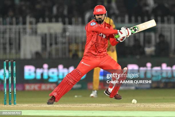 Islamabad United's captain Shadab Khan plays a shot during the Pakistan Super League Twenty20 cricket match between Islamabad United and Peshawar...