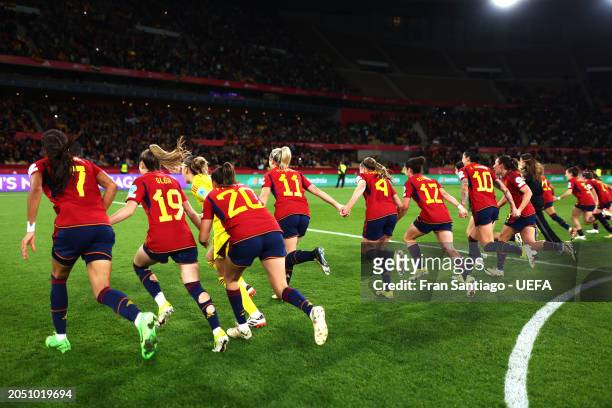 General view of the inside of the stadium as players of Spain run towards their fans as they celebrate after defeating France during the UEFA Women's...