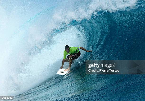 Andy Irons of Hawaii on his way to winning the Quiksilver Pro title June 3, 2003 at Cloudbreak Reef in Tavarua, Fiji. Irons beat American Cory Lopez...
