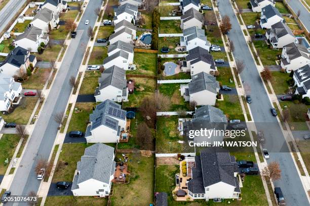 This aerial picture shows homes near the Chesapeake Bay in Centreville, Maryland, on March 4, 2024.