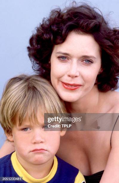 Dutch actress Sylvia Kristel poses for a portrait with her son Arthur in New York, New York, circa 1980.