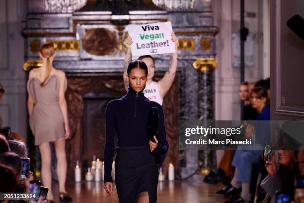 Peta activist walks the runway during the Victoria Beckham Womenswear Fall/Winter 2024-2025 show as part of Paris Fashion Week on March 01, 2024 in...