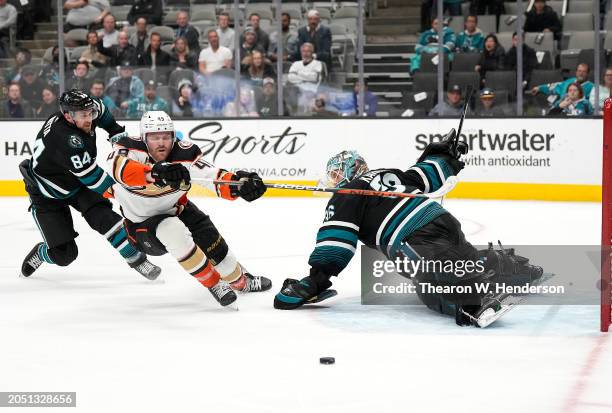 Goalie Kaapo Kahkonen of the San Jose Sharks defends his goal deflecting the shot from Max Jones of the Anaheim Ducks in the third period of an NHL...