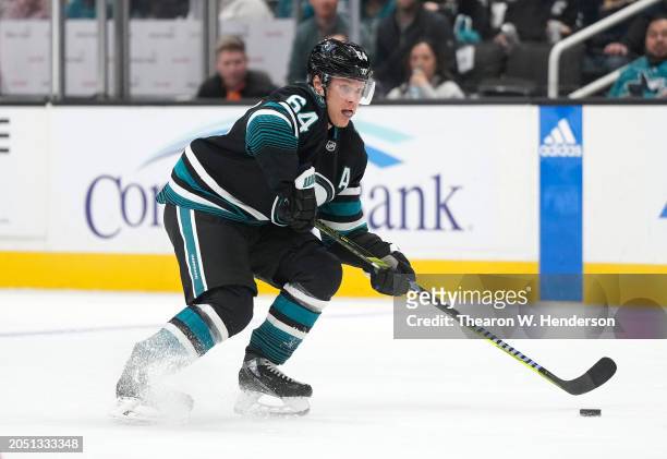 Mikael Granlund of the San Jose Sharks skates with the puck against the Anaheim Ducks in the second period of an NHL hockey game at SAP Center on...